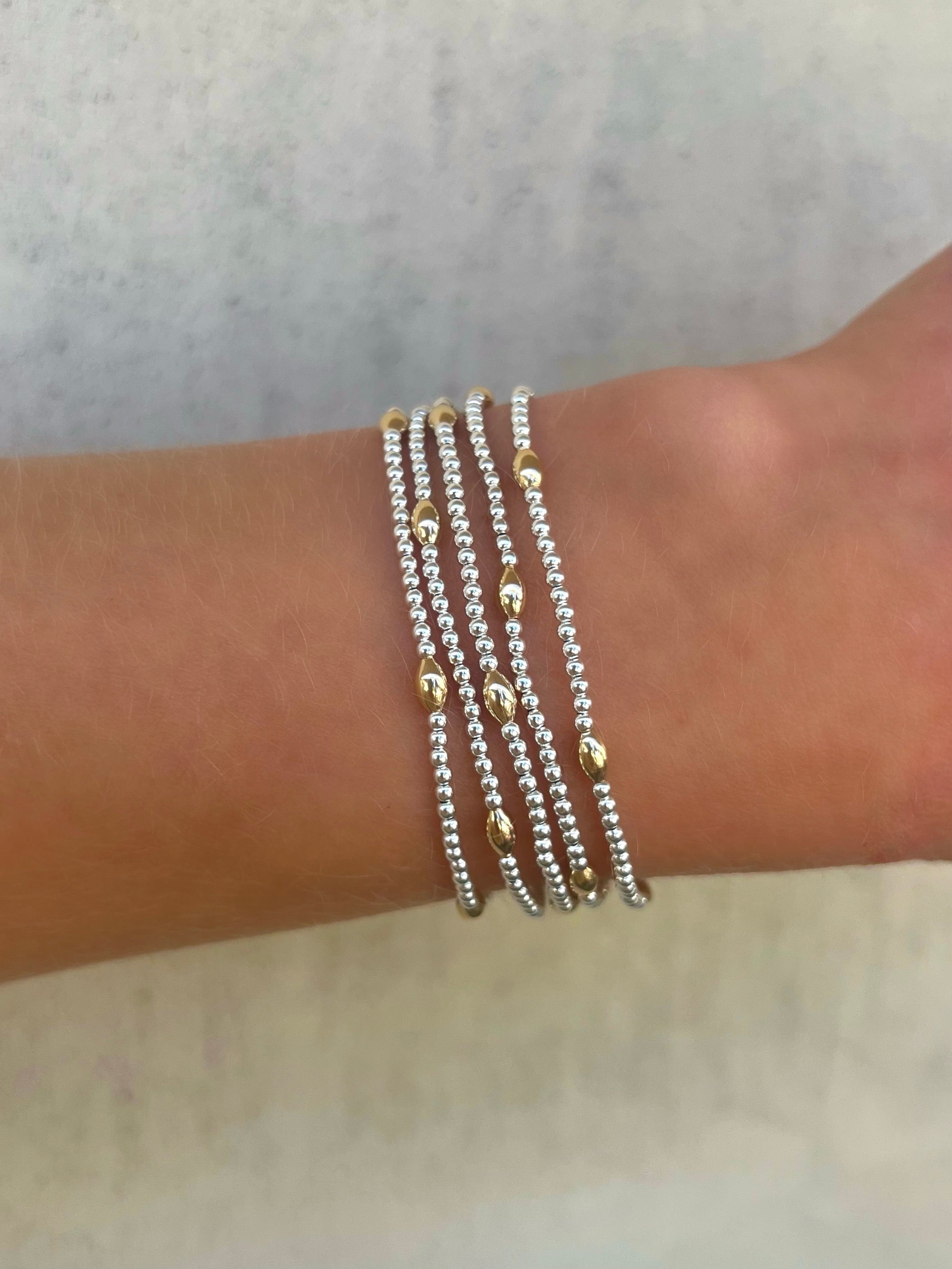 2MM Sterling Silver Bracelet with Yellow Gold Orzo Pattern